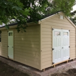 Salem WI 12x20 Gable with lap siding and service door